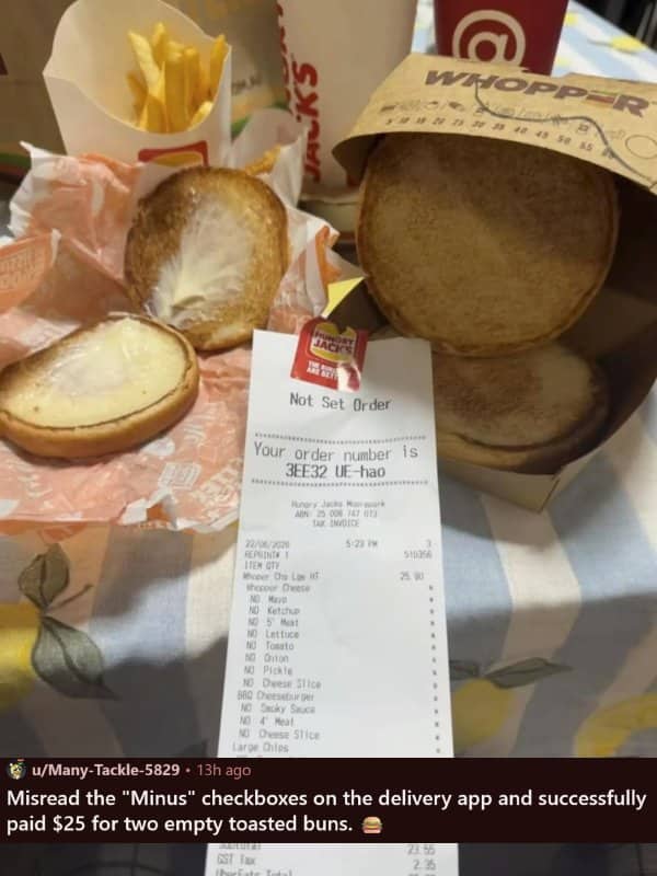 A fast food receipt showing a "minus" on every ingredient next to empty buns.