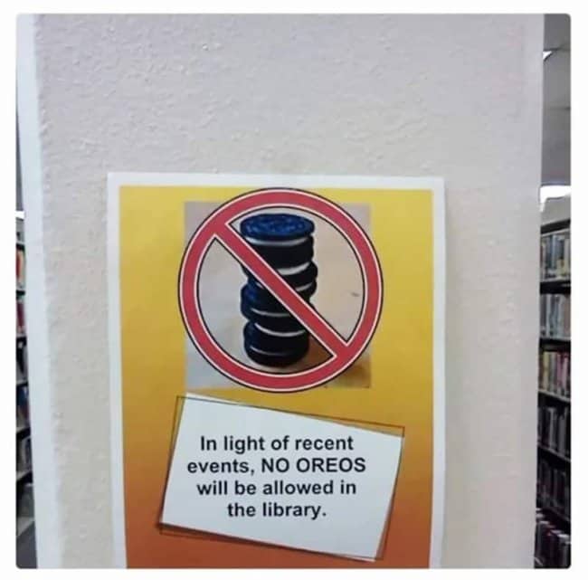 Funny library sign stating that Oreos are no longer allowed due to recent events.