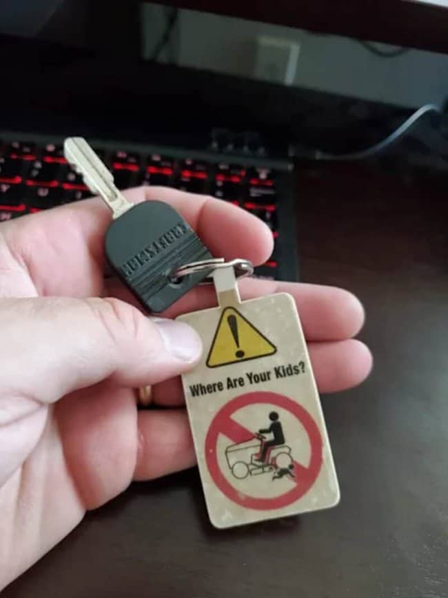 Grim warning label key tag on a lawnmower key asking where are your kids.