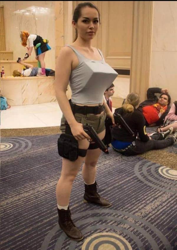 Blursed cosplay photo of a woman dressed as classic low polygon Lara Croft with angular features.
