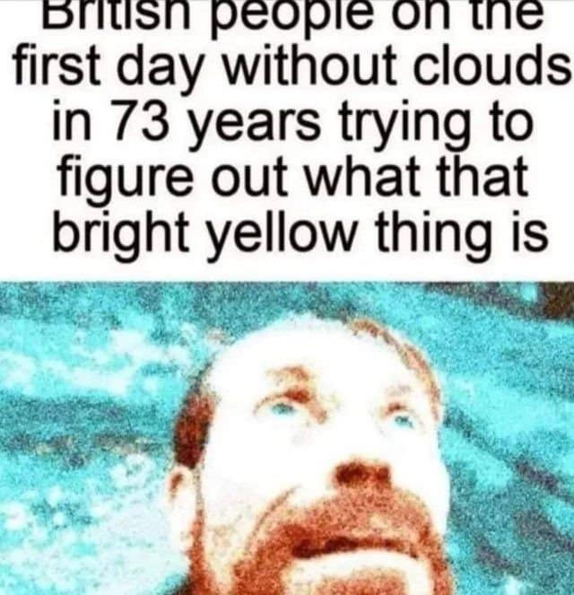 A deep-fried british meme mocks the cloudy UK weather with an incredibly pixelated, oversaturated close-up of a red-bearded man looking directly upward into a blinding light. The chaotic text layer reads: "British people on the first day without clouds in 73 years trying to figure out what that bright yellow thing is."