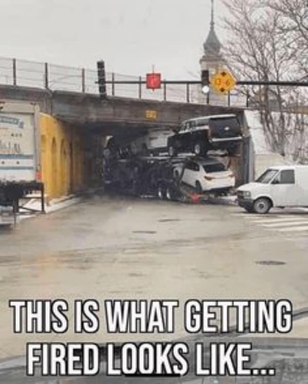 A painful logistics disaster and car fail meme showing a car-carrier semi-truck wedged tightly underneath a low railway bridge, severely crushing the roof of a top-deck black SUV under the bold caption "THIS IS WHAT GETTING FIRED LOOKS LIKE..."