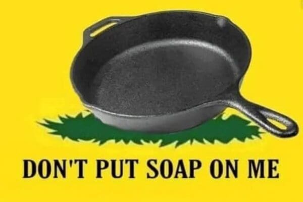 A viral cast iron skillet memes mega-compilation archiving the subculture of heavy-duty cookware enthusiasts, highlighted by a yellow Gadsden flag parody reading "Don't Put Soap on Me," a massive text wall detailing precise pan maintenance while lying in bed, and an automatic dishwasher disaster thread that stripped a year's worth of seasoning off a pan.