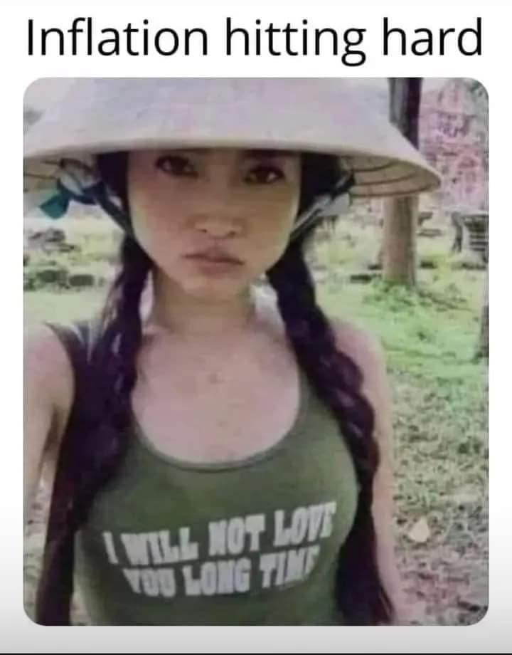 macroeconomic parody layout serving as a classic meme features an Asian woman wearing a traditional conical hat and an olive-green tank top with the text "I WILL NOT LOVE YOU LONG TIME" beneath the bold caption, "Inflation hitting hard."