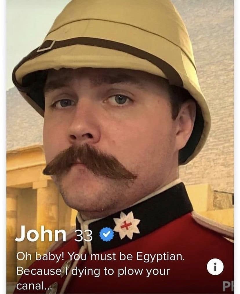 An unhinged dating profile screen capture saved as a classic meme highlights a 33-year-old user named John dressed up in a precise British colonial military uniform and a pith helmet, delivering a wild, historical-themed geographical pickup line: "Oh baby! You must be Egyptian. Because I dying to plow your canal..."
