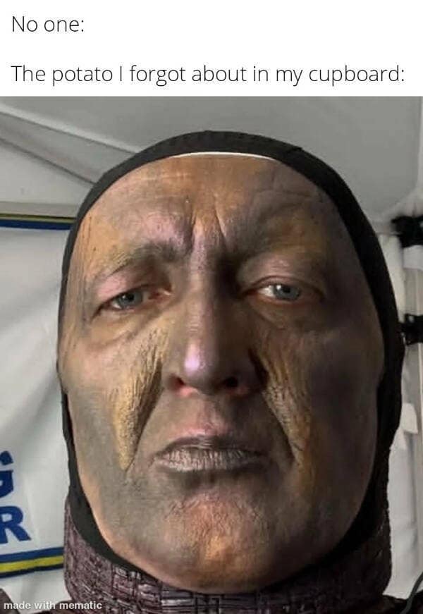 brilliant kitchen neglect joke deployed as a classic meme utilizes the classic "No one:" setup to highlight "The potato I forgot about in my cupboard," paired with a grotesque close-up of an actor wearing highly textured, wrinkled, dark purple and yellow vegetable-like facial prosthetics under a tight black hood.