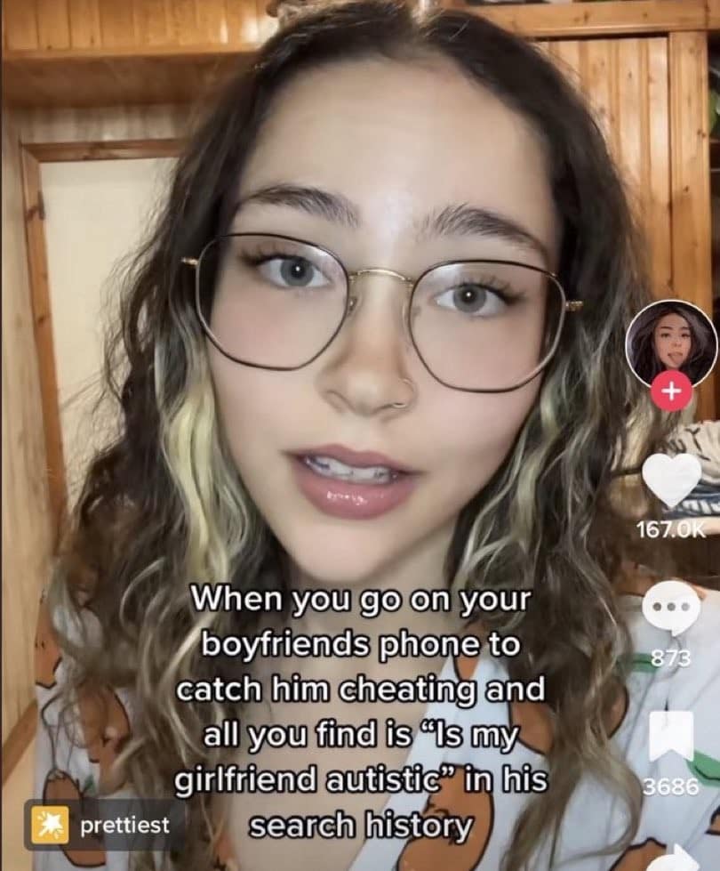 A TikTok-style relationship meme shows a woman speaking to camera with text saying that when you check your boyfriend’s phone to catch him cheating, all you find is a search history asking whether his girlfriend is autistic, flipping suspicion into an unexpectedly tender confusion spiral.