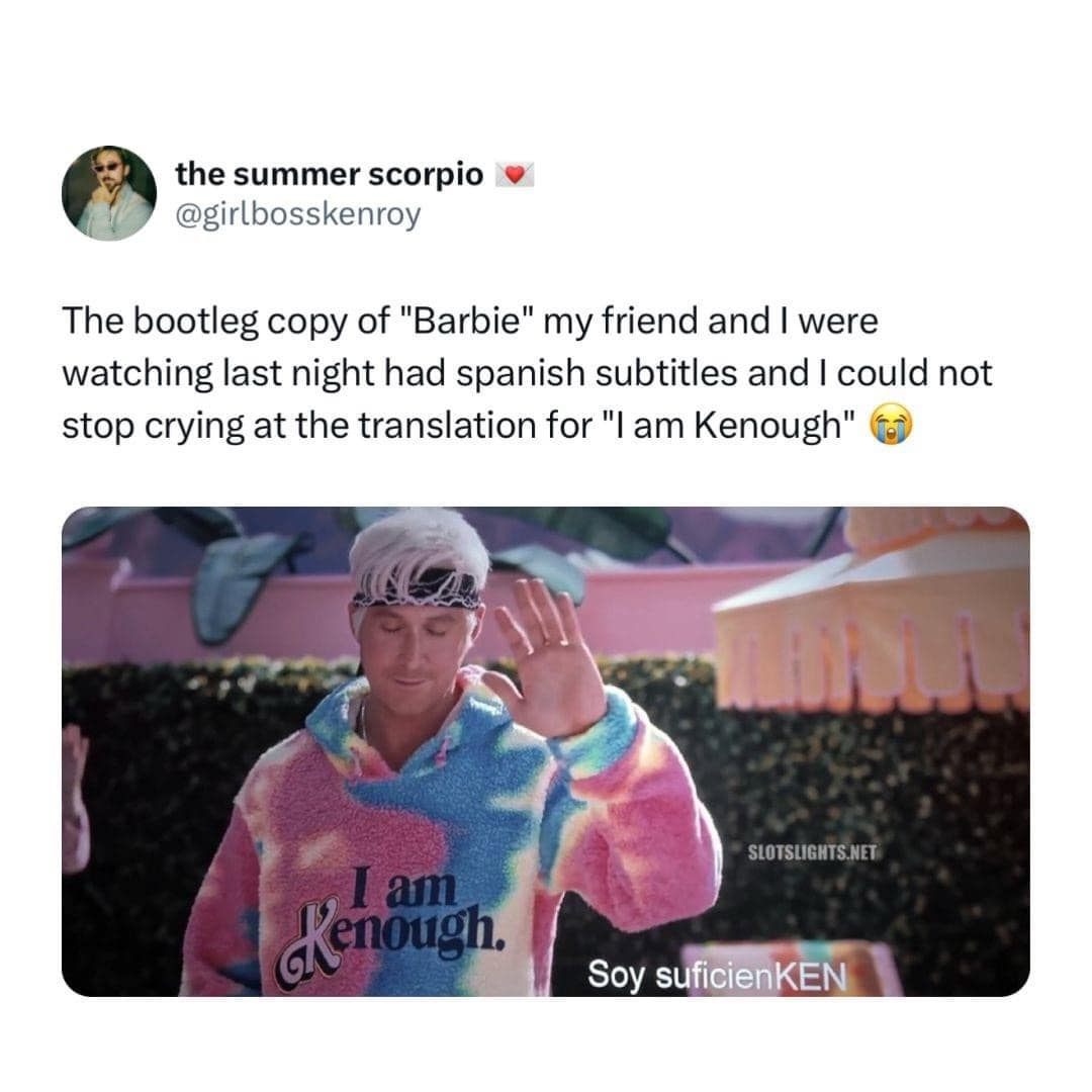 This viral pop-culture classic meme showcases a screenshot of a tweet by user @girlbosskenroy laughing at an altered bootleg movie file. The image below depicts Ryan Gosling from the Barbie movie waving in his famous tie-dye hoodie, accompanied by a hilarious Spanish translation subtitle that translates "I am Kenough" into "Soy suficienKEN."