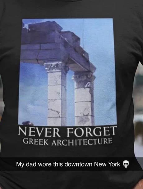 A custom black graphic tee in a classic meme displaying a photo of ancient stone columns with the bold caption "NEVER FORGET GREEK ARCHITECTURE," paired with a Snapchat overlay note about wearing it in downtown New York.