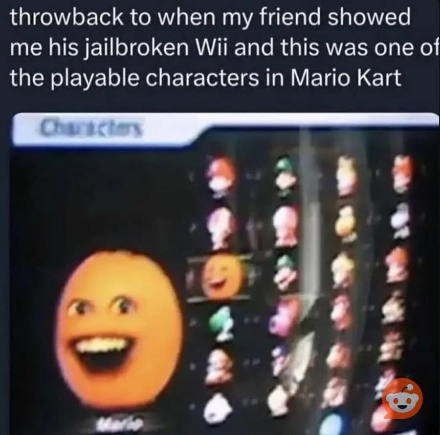 A low-resolution television screen photo captured as a classic memes post, showing a homebrewed Mario Kart Wii character select menu where Mario’s slot has been custom-modded with the face of the Annoying Orange.