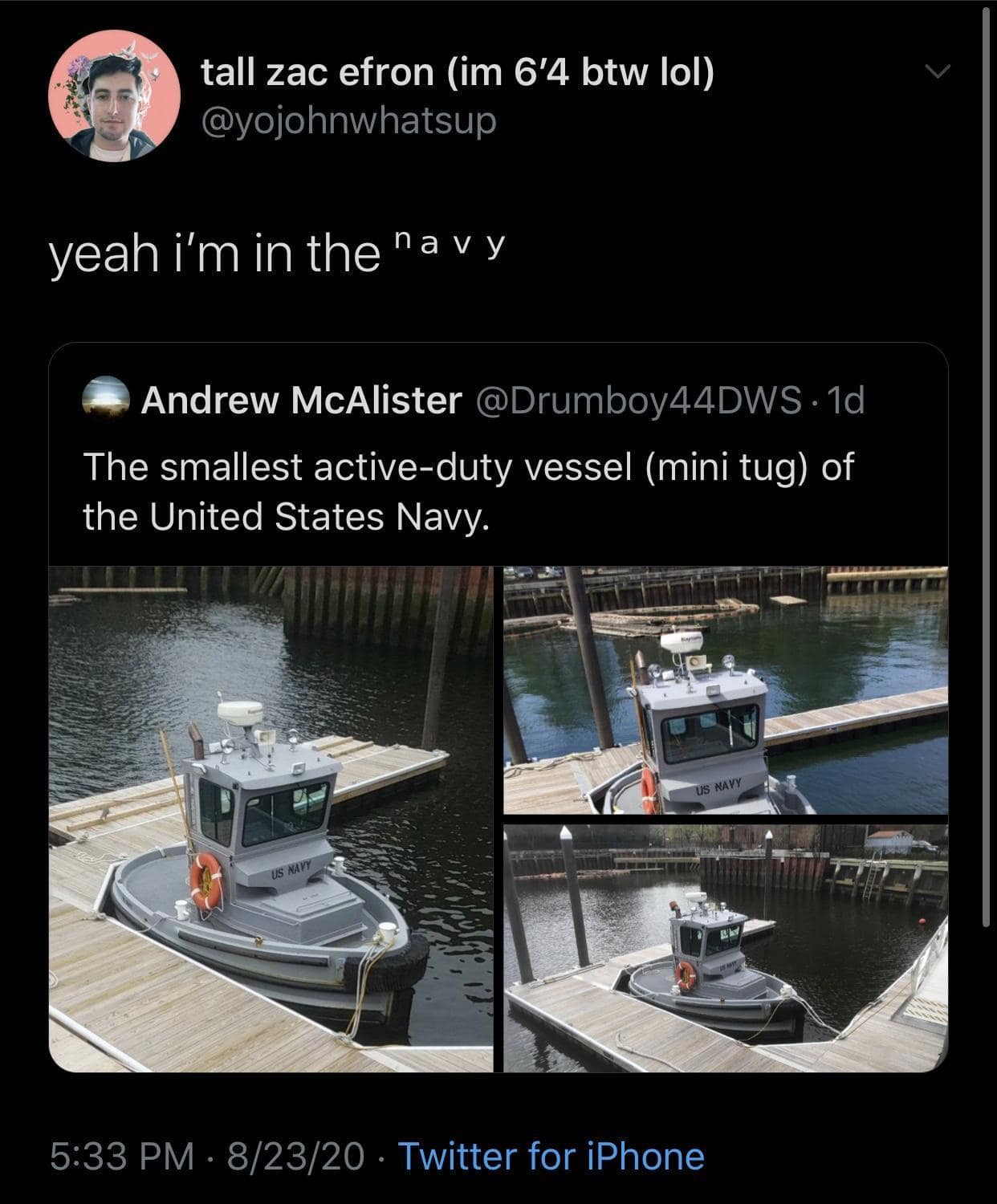 A tweet jokes “yeah I’m in the navy” while sharing photos of the United States Navy’s smallest active-duty vessel, a tiny mini tugboat tied to a dock, creating a classic meme about serving your country at approximately bathtub scale.
