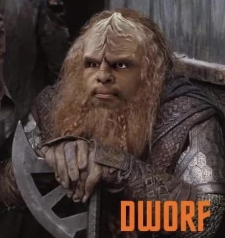 A sci-fi classic meme blending Star Trek and fantasy tropes, featuring the Klingon character Worf edited to look like a stout, bearded fantasy dwarf leaning on a battleaxe, boldly labeled "DWORF."