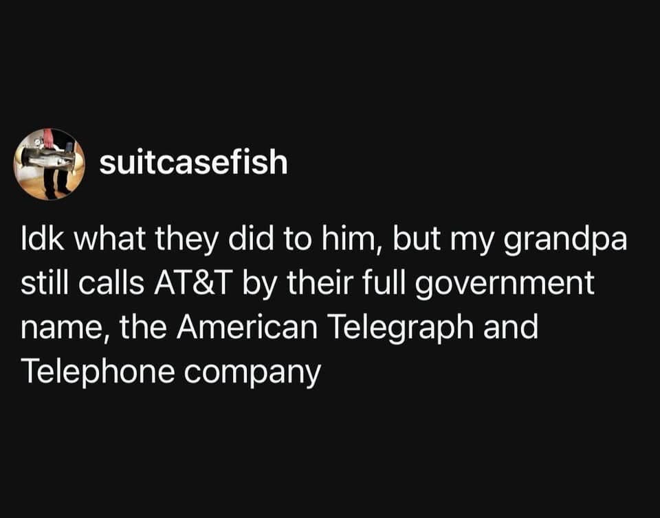 A minimalist interface screenshot popular in grids of old memes showcases a text post from user suitcasefish explaining that their grandpa refuses modern corporate acronyms and still calls AT&T by its full "government name," the American Telegraph and Telephone company.