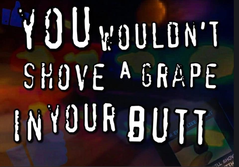 A dark, dramatic reaction image reads “You wouldn’t shove a grape in your butt,” using horror-movie lettering over a blurry background to deliver the kind of unprompted classic meme challenge that feels both wildly specific and spiritually impossible to ignore.