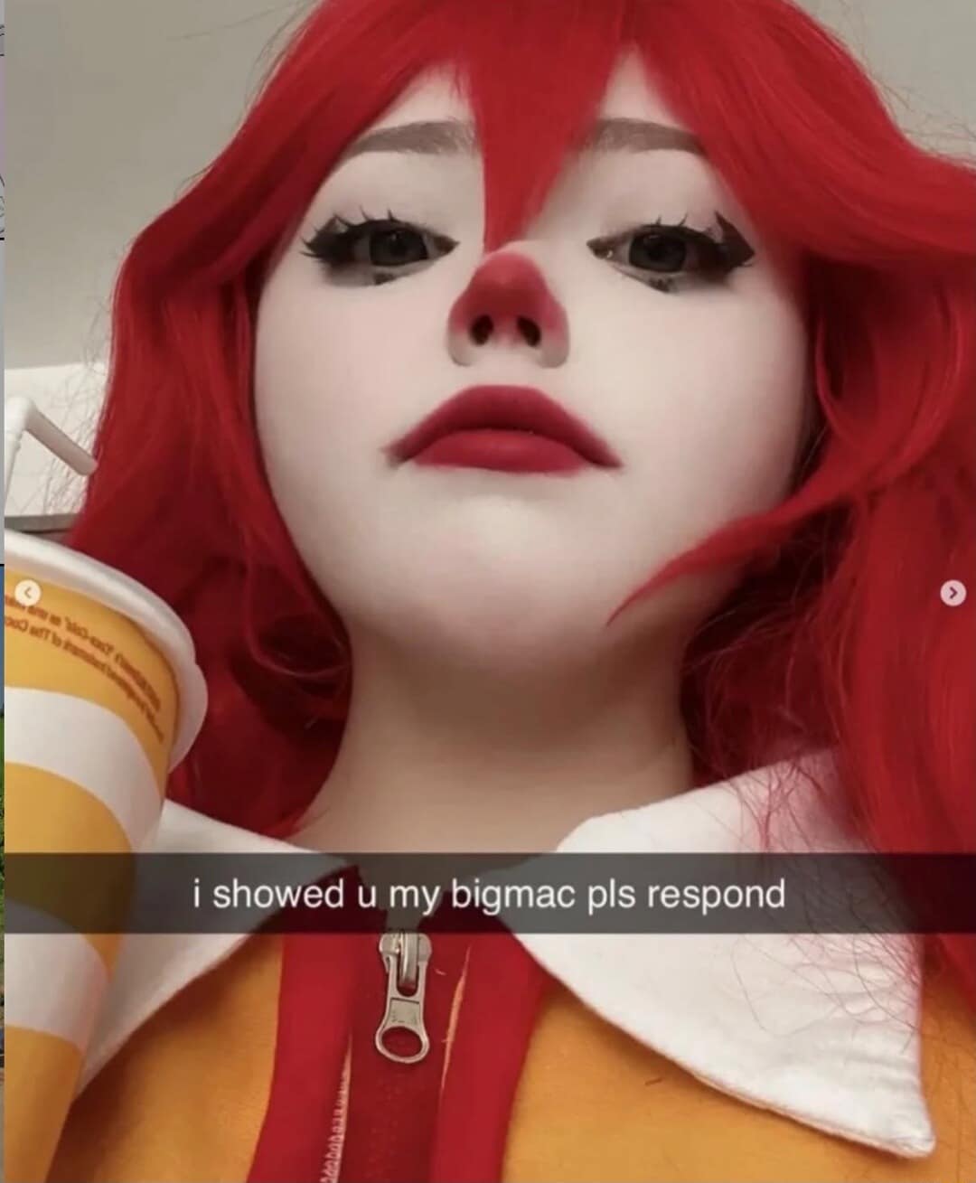 Close-up of a female Ronald McDonald clown cosplayer looking down into the camera lens with a Snapchat text overlay reading "i showed u my bigmac pls respond" in an unhinged classic meme.