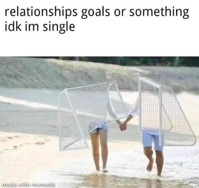 A classic meme visual pun displaying an image captioned "relationships goals or something idk im single," showing a romantic couple walking hand-in-hand along a white sand beach, but their torsos have been completely replaced with large white soccer nets ("goals").
