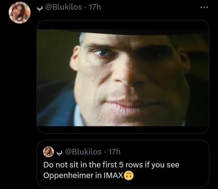 A cinematic classic meme showing a deeply distorted, wide-angle, giant face of actor Cillian Murphy playing Oppenheimer, warning viewers not to sit in the first five rows of an IMAX theater while watching the film.