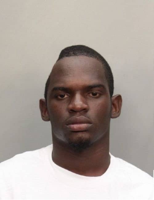Mugshot of a man with a distinct indentation on the right side of his head.