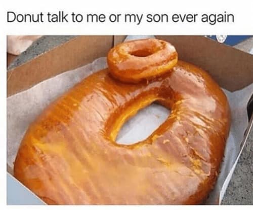 A clever perspective donut meme featuring an absolute unit of an oversized giant glazed donut inside a cardboard bakery box, with a completely standard-sized glazed donut resting on top of its rim, perfectly matching the viral pop-culture line, "Donut talk to me or my son ever again."