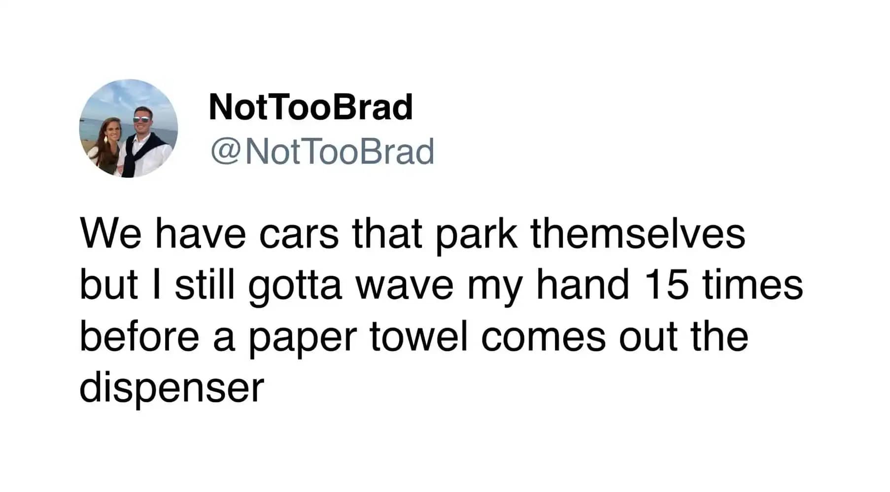 Humorous driving meme comparing advanced self parking cars to manual paper towel dispensers.