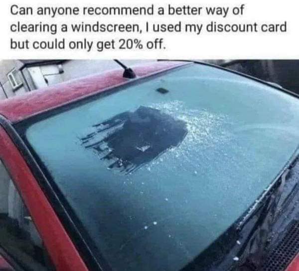 literalist winter driving joke showcased as a dumb meme shows a red car with an entirely frosted windshield save for a tiny rectangular cleared box, captioned with a user asking for a better way to clean glass because they used a discount card but "could only get 20% off."