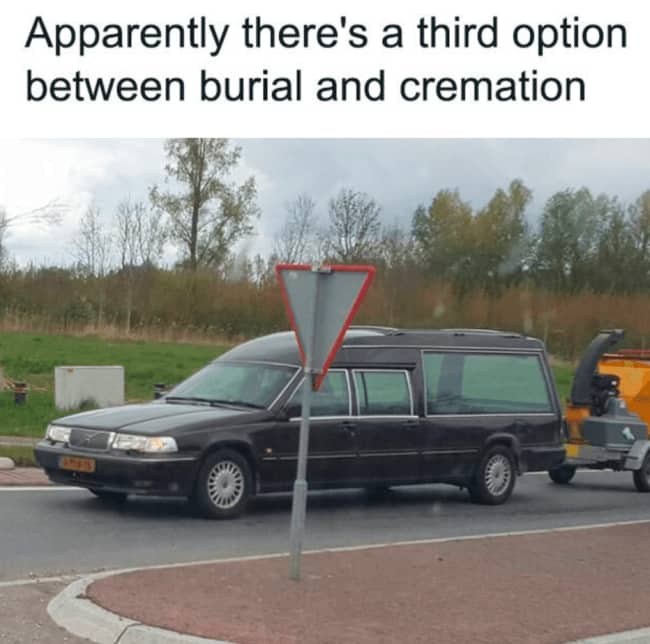 Hearse towing an orange wood chipper on the road in a morbid death edgy meme.