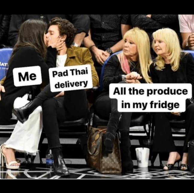Food delivery meme using a courtside kiss photo labeled “Me” and “Pad Thai delivery,” while two nearby women labeled “All the produce in my fridge” stare in judgment, capturing the betrayal of ordering takeout while vegetables slowly become compost with Wi-Fi.