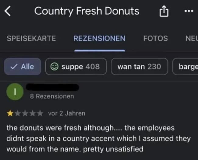 A literalist linguistic complaint preserved as a funny google review for Country Fresh Donuts details a 1-star rating where the customer notes that while the pastries were fresh, they left unsatisfied because the staff failed to speak with a country accent.