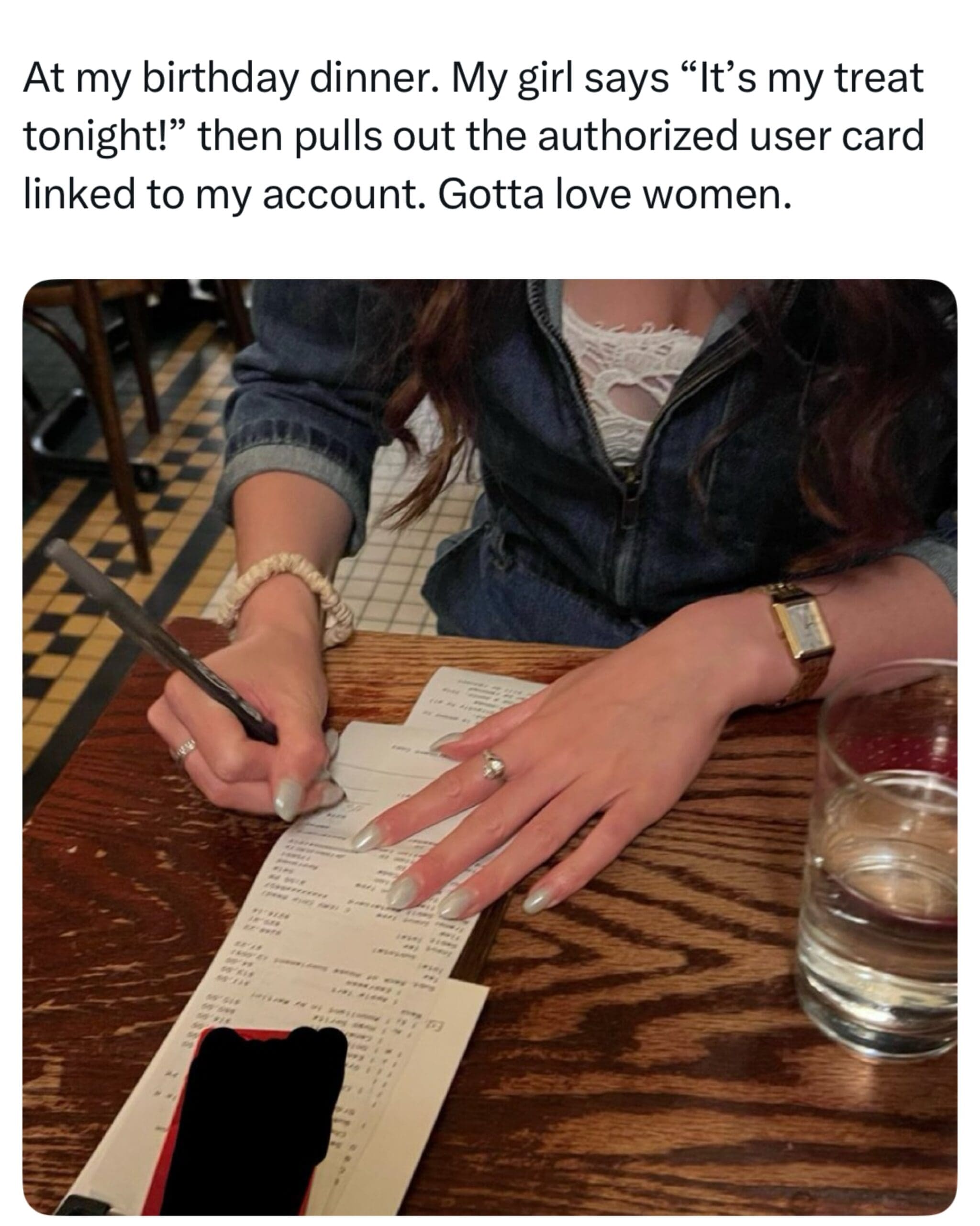 Meme showing a woman paying for a restaurant bill with her partner's credit card.
