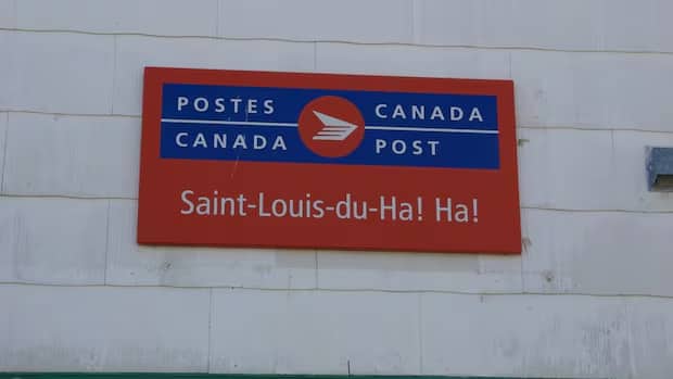 Red and blue official Canada Post branch sign for Saint-Louis-du-Ha! Ha!