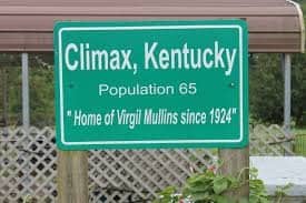 Green roadside population sign marking the small community of Climax, Kentucky.