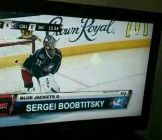 Funny hockey broadcast screenshot showing a hilarious typo on a goalie's name bar on television.