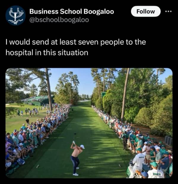Golfer teeing off at a tournament with a massive crowd lining both sides of the narrow fairway.