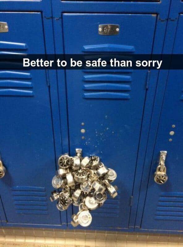 A high school locker door overflowing with dozens of interlocking combination padlocks.