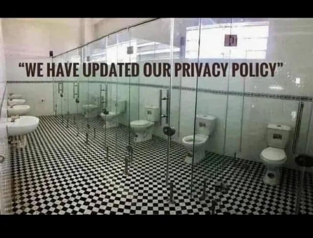A corporate data policy parody featured in a funny meme layouts a public restroom installation where all the stalls are built out of completely clear, transparent glass panels under the ironic quote banner, "WE HAVE UPDATED OUR PRIVACY POLICY."