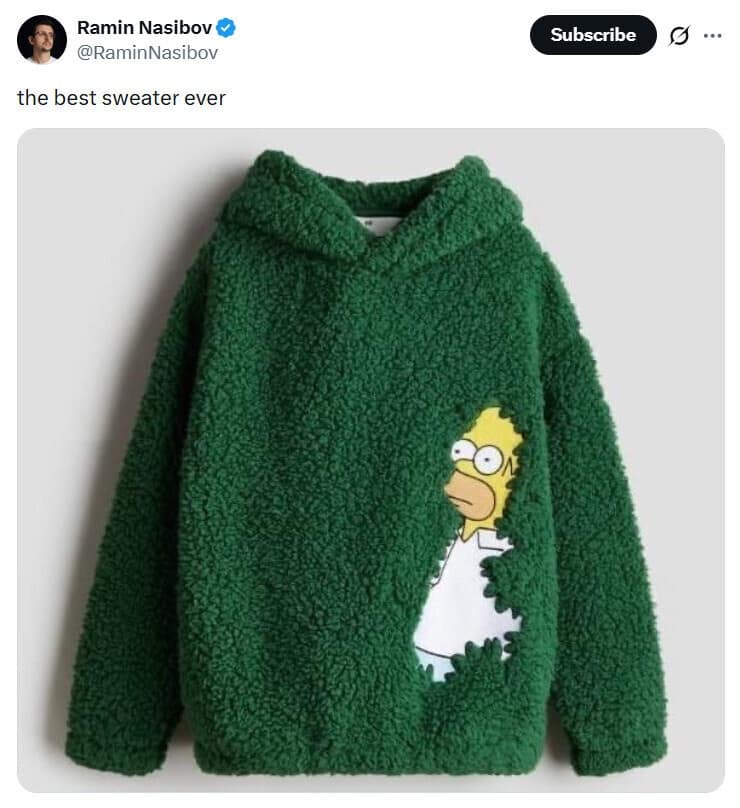 apparel post on X by Ramin Nasibov (@RaminNasibov) showcasing a funny meme fashion piece: a deep green textured fleece sherpa hoodie where Homer Simpson is custom-embroidered peeking out from the fabric, perfectly recreating his legendary bush retreat meme.