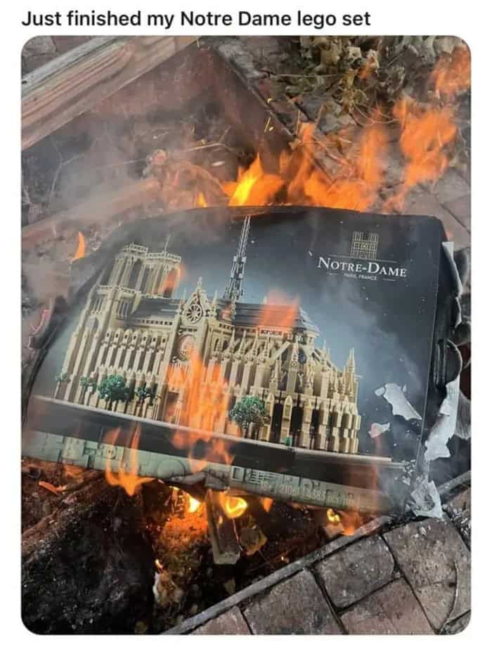 A dark-humor history joke in a meme dump displays a premium cardboard packaging box for the LEGO Architecture Notre-Dame set being burned to ashes inside an outdoor fire pit.