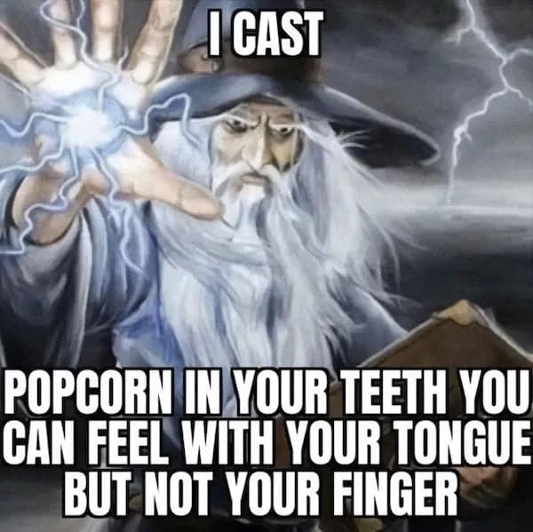 High-fantasy wizard character art image macro in a meme dump casting a devastatingly annoying minor physical curse regarding a phantom piece of popcorn trapped between your teeth.