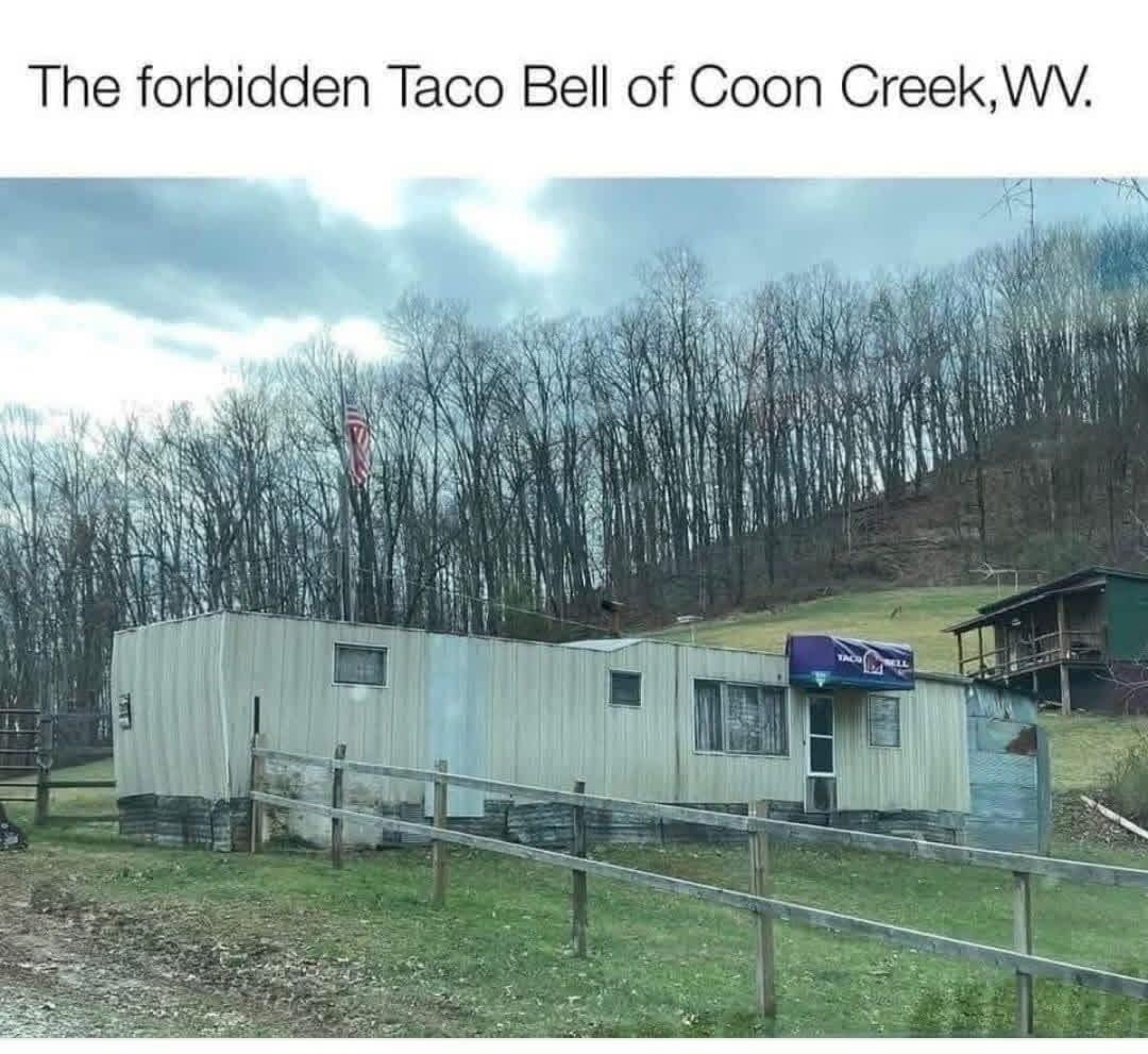 A meme dump picture of rural surrealism titled "The forbidden Taco Bell of Coon Creek, WV," showing a weathered, single-wide mobile home trailer in a field with a commercial purple Taco Bell awning mounted over its front screen door.