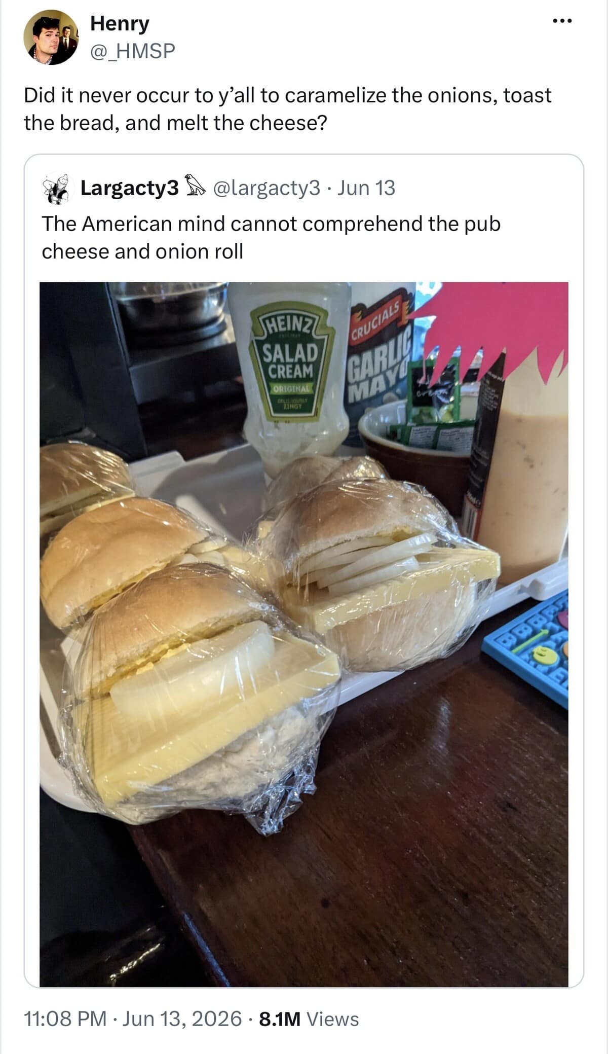 An X platform social screenshot showing an unheated British pub cheese and onion roll stuffed with a massive cold slab of cheddar and raw white onion rings, categorized as a viral funny meme.