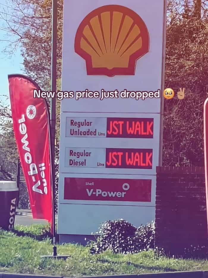 A gas price inflation joke in a meme dump displays a Shell station sign where the price readouts have been humorously replaced with bright red digital text reading "JST WALK" for both gas and diesel.