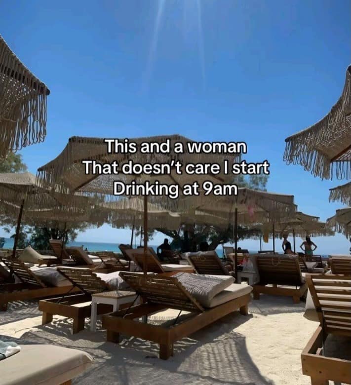 A pure relaxation travel graphic from a meme dump depicts rows of empty luxury beach resort lounge chairs under thatched palapa umbrellas looking out at a bright blue sea, paired with a caption about finding a partner who doesn't care about a 9:00 AM drinking routine.