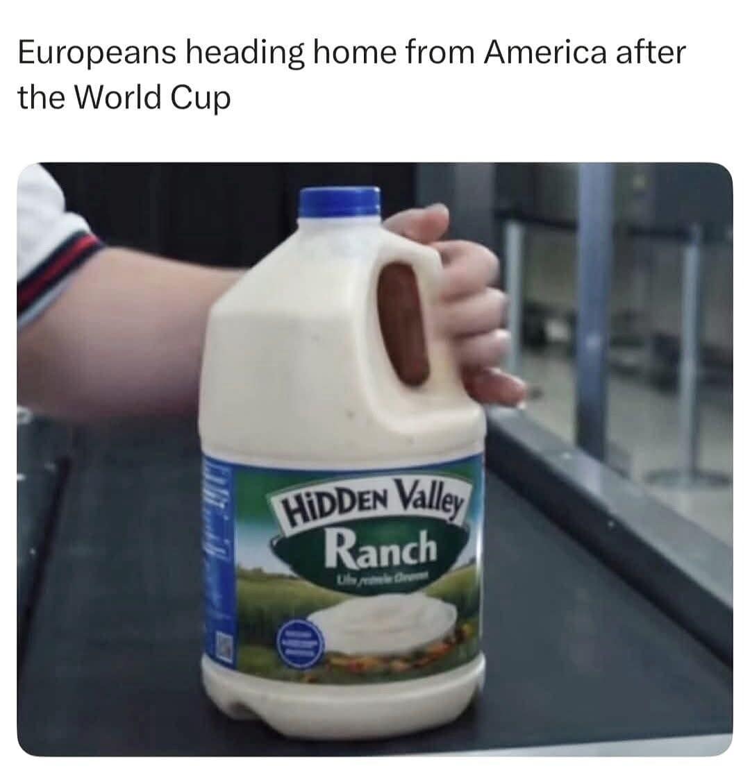 A hilarious food-culture item from an online meme dump poking fun at international sports fans, showing text about Europeans heading home from America after the World Cup paired with a photo of a massive, industrial-sized plastic gallon jug of Hidden Valley Ranch dressing moving along an airport baggage carousel belt.