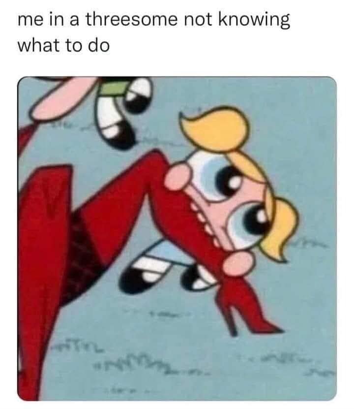 An animation frame crop from The Powerpuff Girls operating as a funny meme about intimacy awkwardness, showing Bubbles looking deeply confused while blankly biting into the heel of a giant red boot.