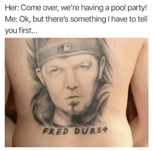 Large back tattoo portrait of Fred Durst from Limp Bizkit with his name misspelled.