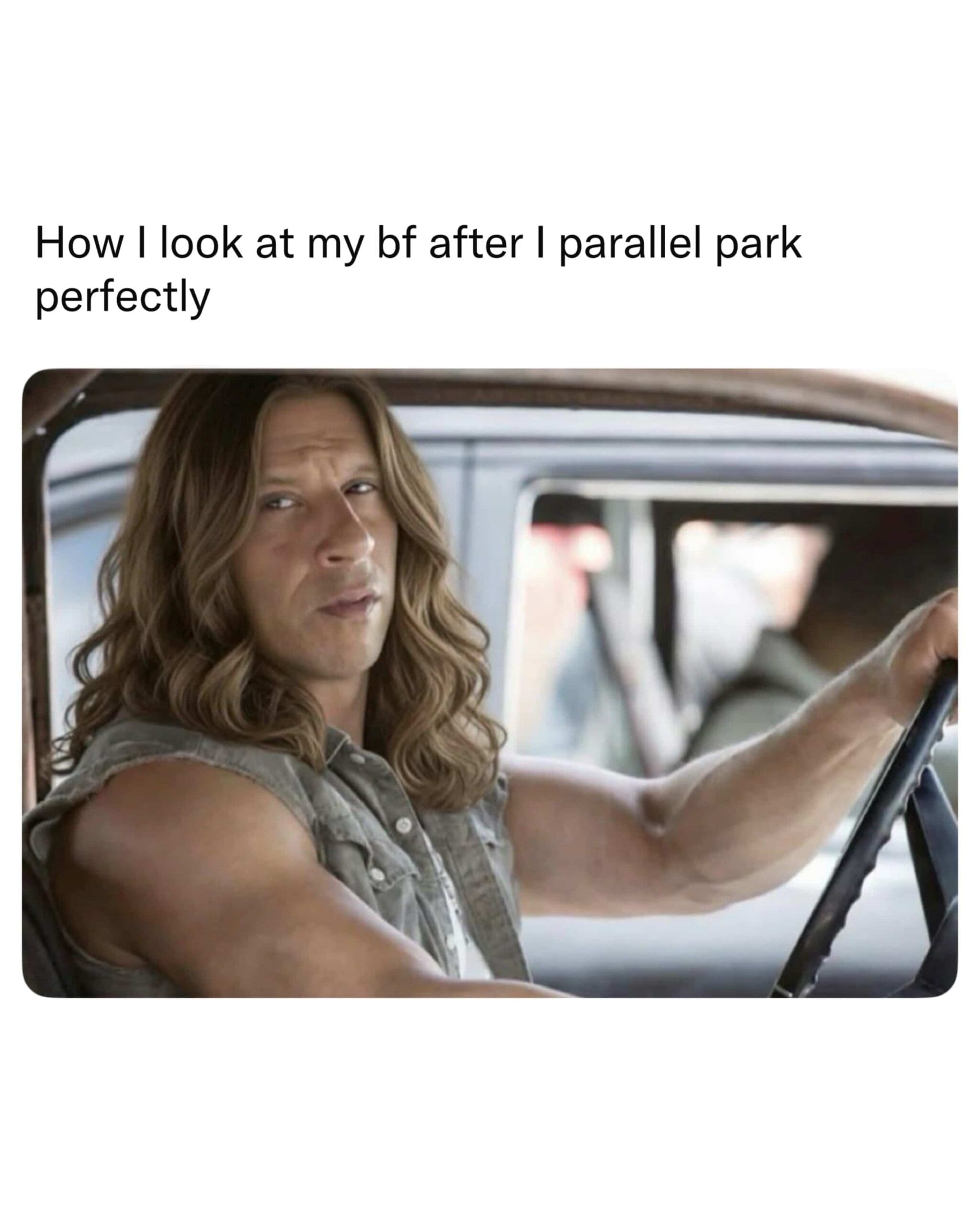 Relatable driving meme featuring actor Vin Diesel edited with long glamorous hair looking back confidently.