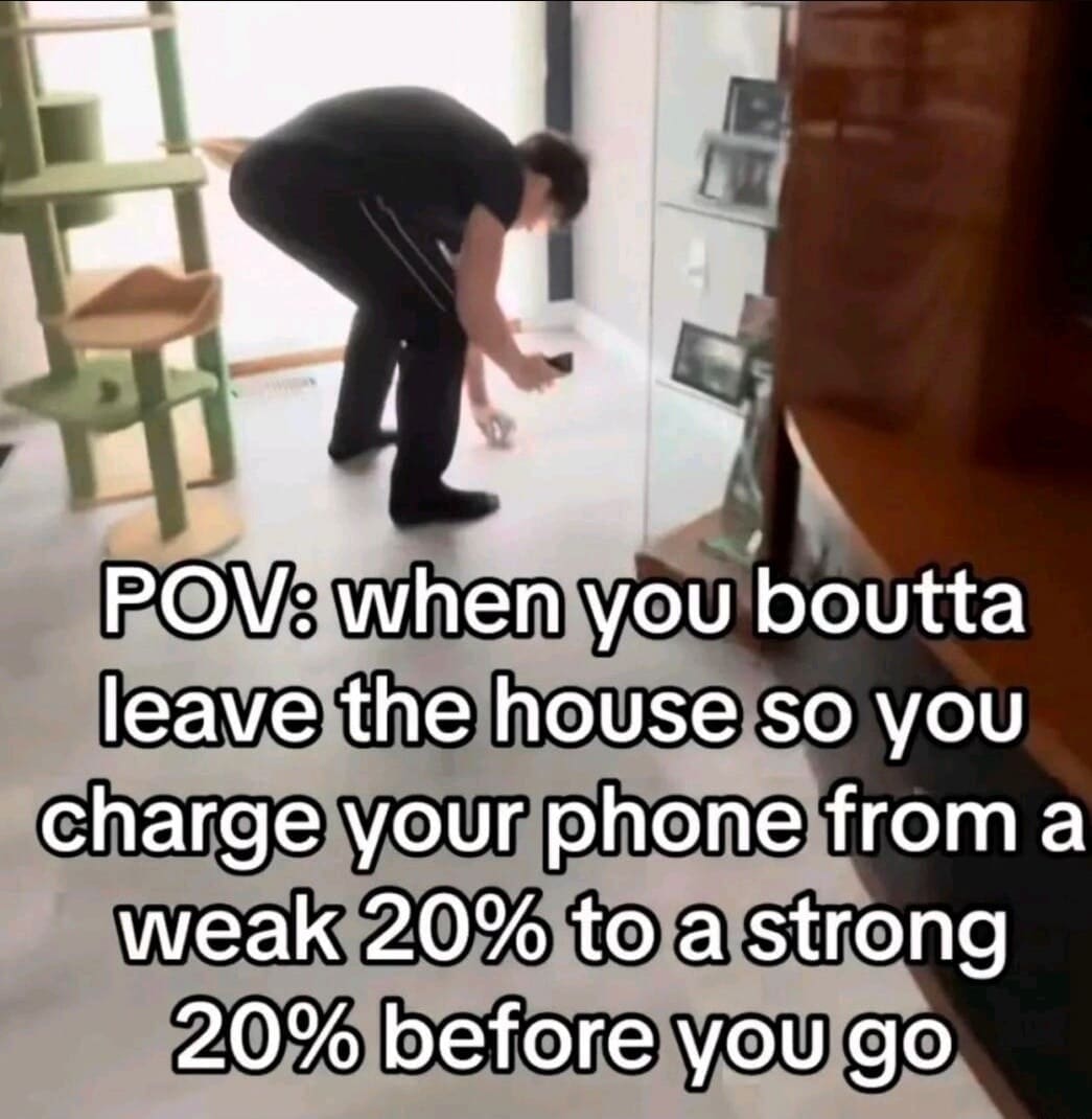 A tech-centric addition to relatable internet memes, showing a guy leaning over to plug his phone into a wall outlet, captioned: "POV: when you boutta leave the house so you charge your phone from a weak 20% to a strong 20% before you go."