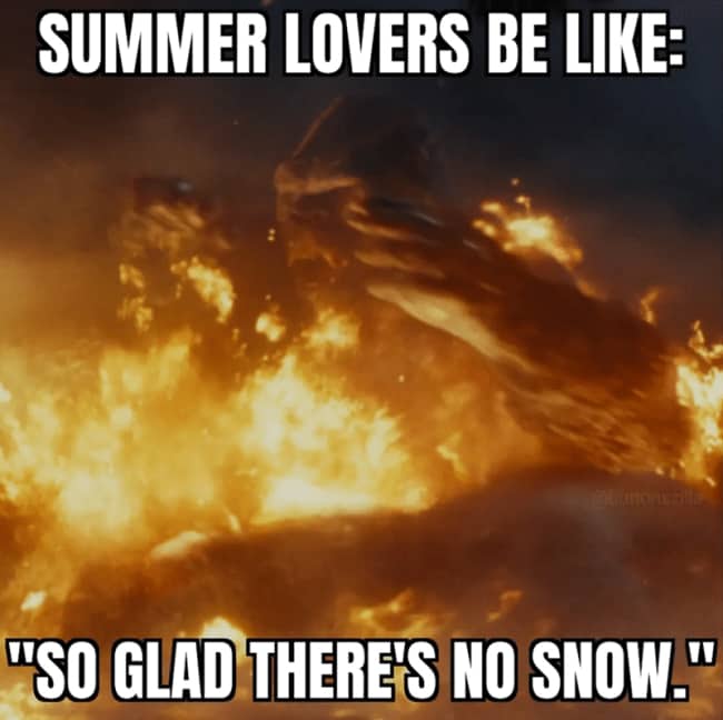 Movie scene of a giant creature engulfed in roaring flames representing summer weather lovers.