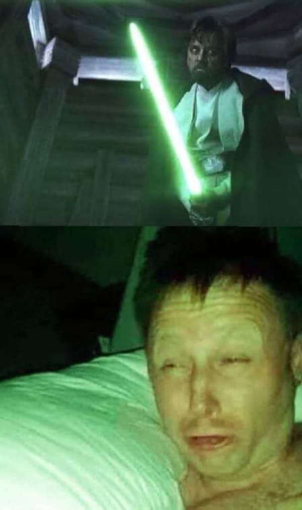 A two-panel reaction meme comparing a glowing green lightsaber to a person waking up blind in bed.