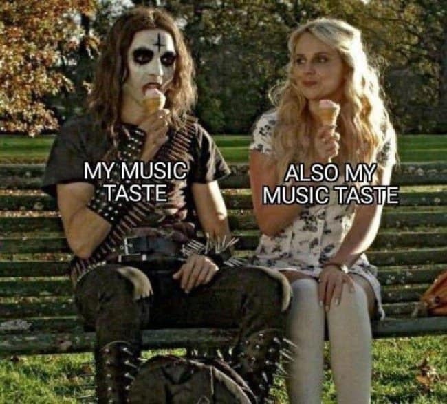 A hilarious contrast-themed music meme showing a black metal musician in full corpse paint and spiked leather armor labeled "MY MUSIC TASTE" sitting on a sunny park bench eating an ice cream cone next to a blonde woman in a cheerful floral dress labeled "ALSO MY MUSIC TASTE."